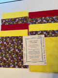 Yellow White Daisy on.  Red.  SQ 130